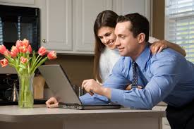 self help - husband and wife on laptop